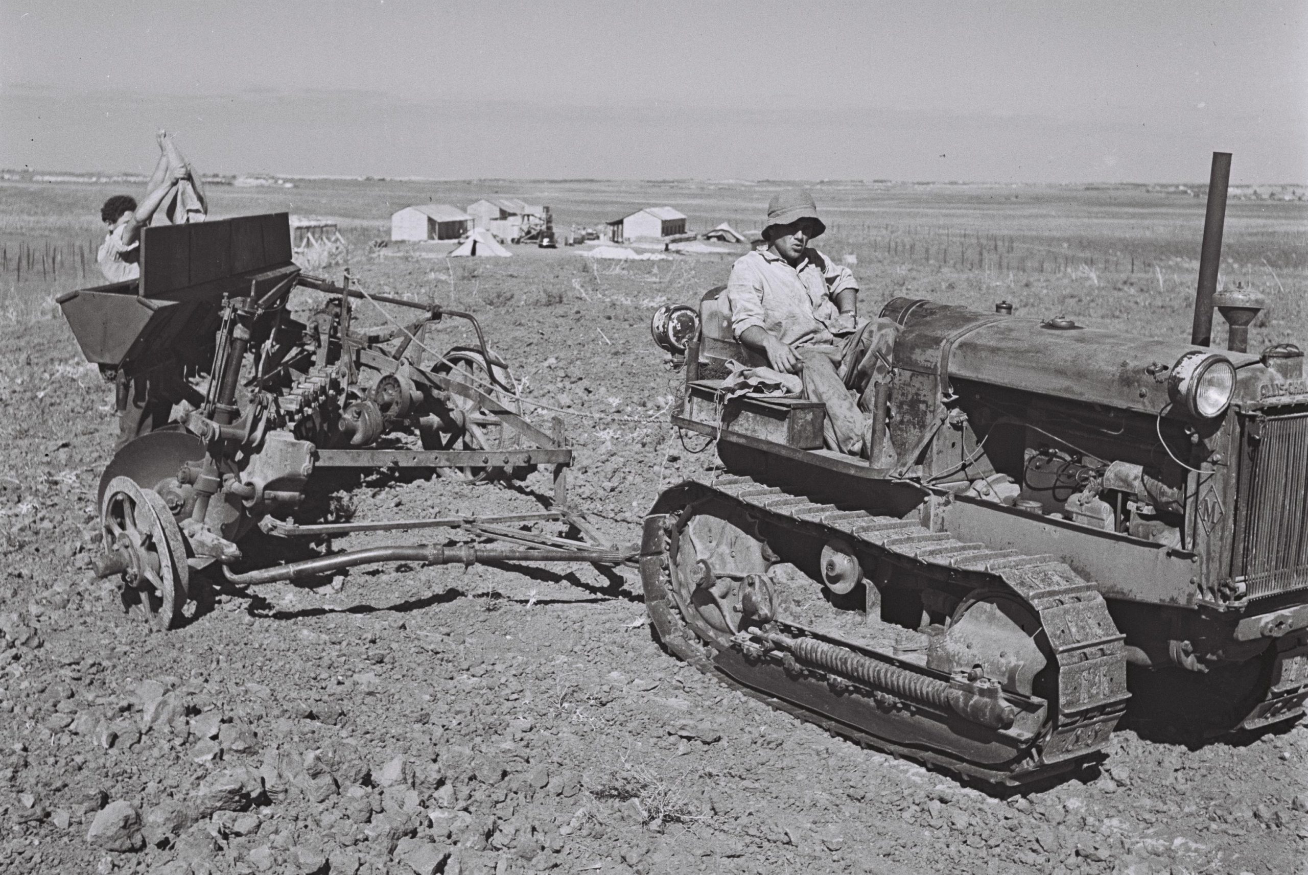 Eleven Crucial Dots on the Map
Zoltan Kluger, Israel Government Press Office Pioneers plow the fields of Kibbutz Kedma, one of the 11 points in the Negev. November 1946